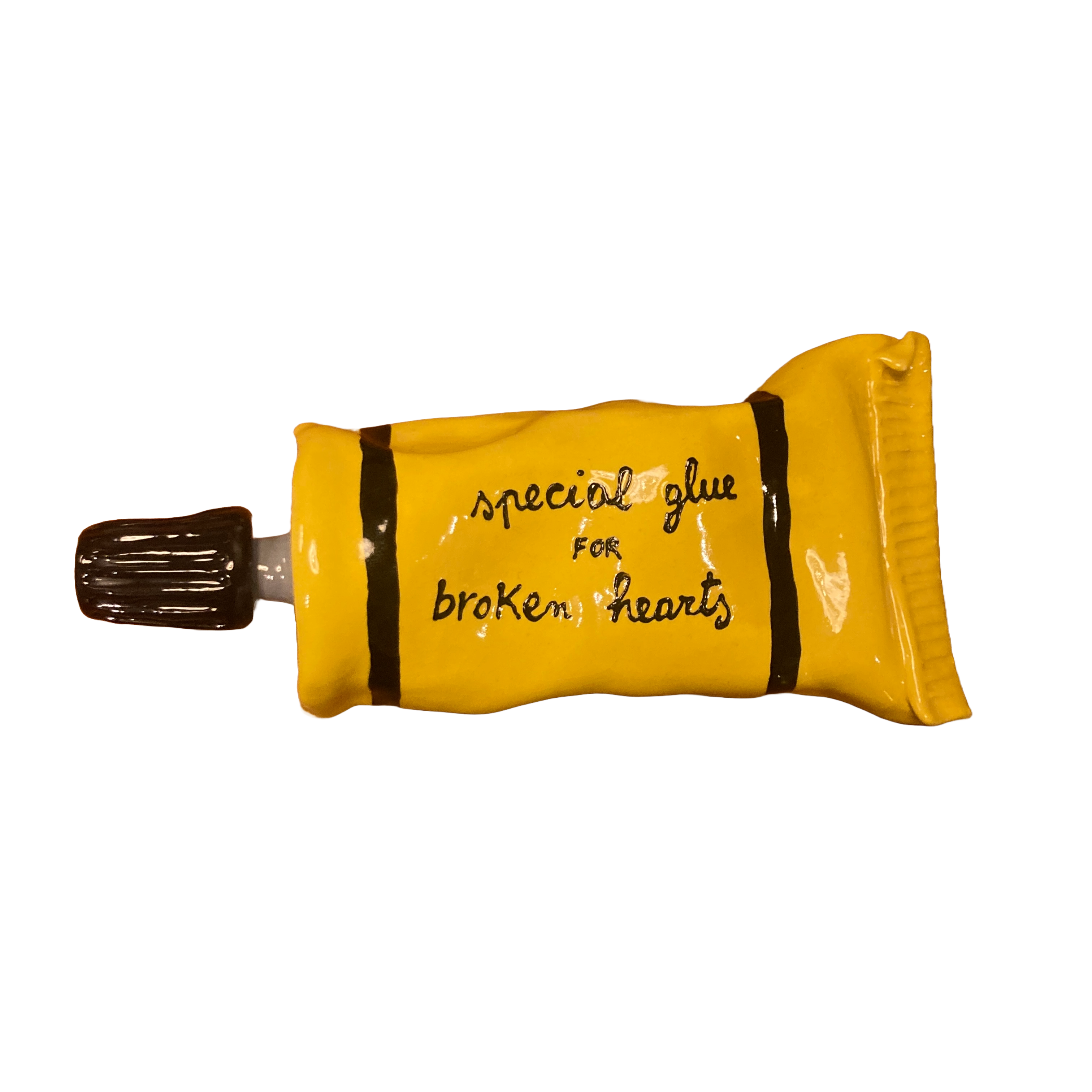 'Special Glue For Broken Hearts' Klebetube aus Keramik, gelb | Michela Castagnaro