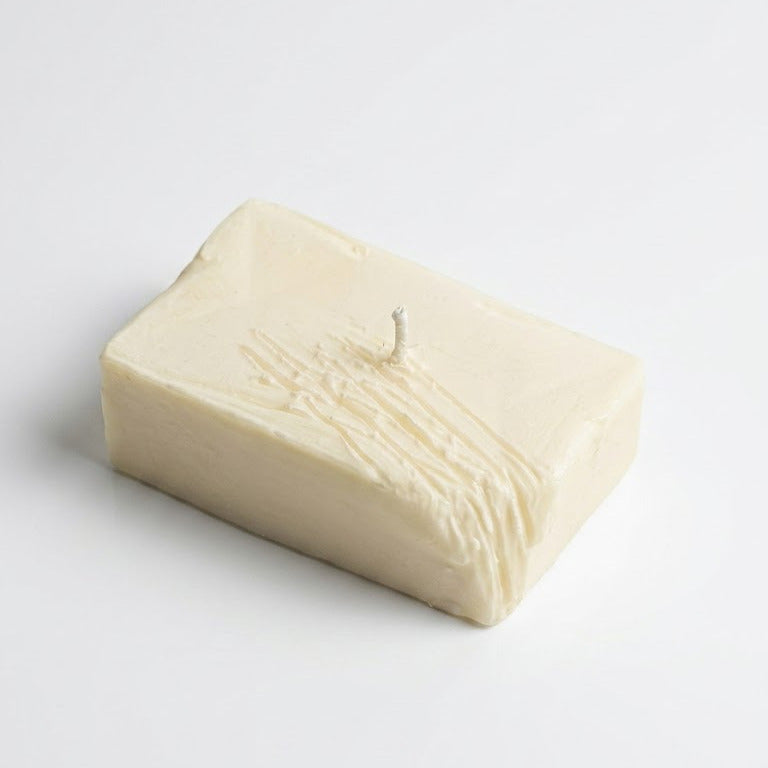 Kerze in Butterform, handgefertigt in Italien